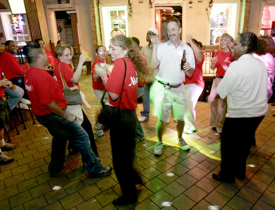 Workers from the Marriott hotel have some fun at Razzoo on Bourbon Street, Friday night.