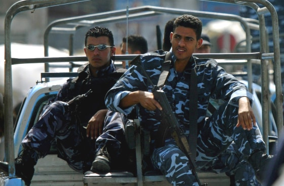 Palestinian police officers patrol the streets of the Jebaliya refugee Camp, northern Gaza Strip, on Sunday.