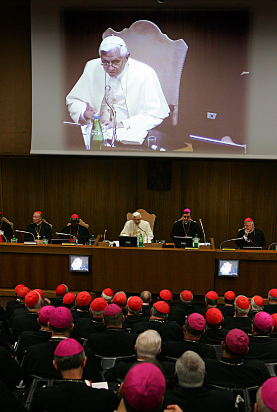 Pope Benedict XVI delivers a speech during the first day of a three-week meeting of the world's bishops at the Vatican Monday. More than 250 church officials from 118 countries will take part in the Synod of Bishops.