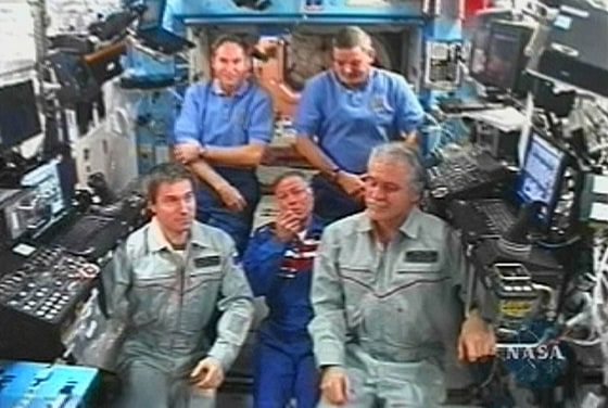 US scientist and businessman Gregory Olsen talks during news conference from Unity module of ISS