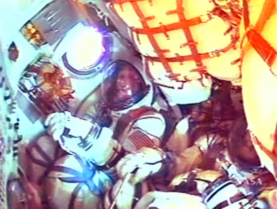 American Greg Olsen is seen along with Soyuz TMA spacecraft Commander Valery Tokarev after launch on Soyuz TMA spacecraft