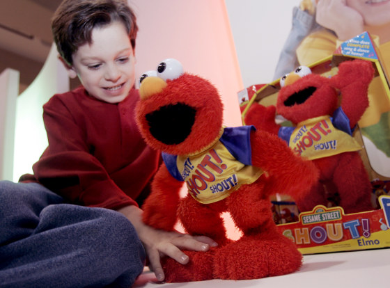 Matthew Conboy, 6, of Elmwood Park, N.J., plays with a Shout Elmo by Mattel during Toy Wishes Magazine Holiday Preview in New York.