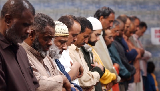 Worshippers pray during Ramadan services at the Islamic Center of Hawthorn on Sunday in Hawthorn, Calif., where the imam urged prayer for victims of the Pakistani earthquake.