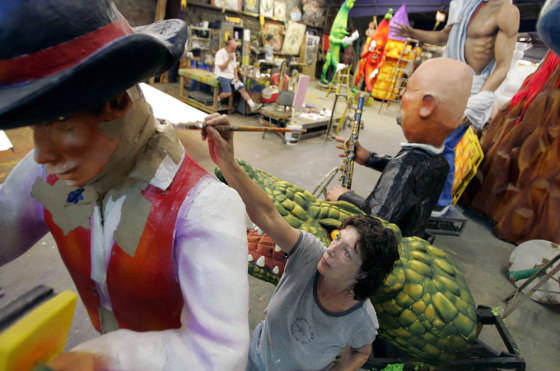 Carter fixes floats damaged by Hurricane Katrina at Mardi Gras World in Algiers