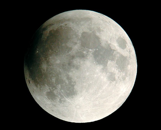 The moon looks here about as it will at the middle of its weak little eclipse on Monday. Although the umbra covers only a bit of the moon's edge, the pale penumbra washes over a wider area. Sky & Telescope associate editor Gary Seronik shot this photo during the eclipse of Nov. 8, 2003.