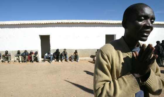 Cameroonian Jack Dikama speaks to the pr