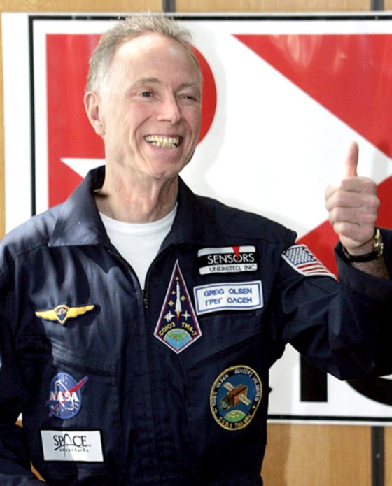 US space tourist Greg Olsen gestures dur