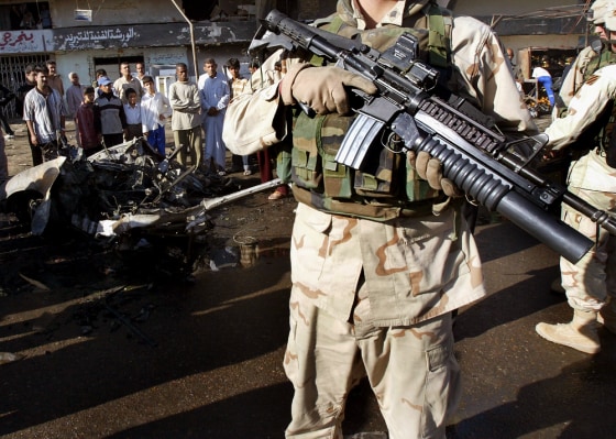 Car Bomb Targets Troops As U.S Death Toll Reaches 2000