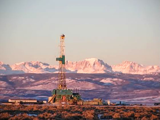 A drill rig operates in Wyoming's Pinedale Anticline, where energy companies want to extend drilling year-round.