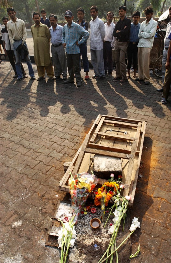 Delhites gather at the site of the 29 Oc