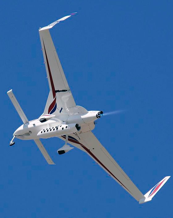 The EZ-Rocket soars during a demonstration flight at the Countdown to the X Prize Cup exposition in October. The rocket plane set a record for its class Saturday with a 10-mile, point-to-point flight.