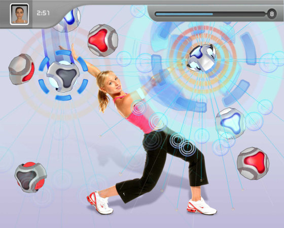 This screenshot from "EyeToy: Kinetic" shows a player engaged in one of the workout modes. The game includes a 12-week training program and four different exercise styles.