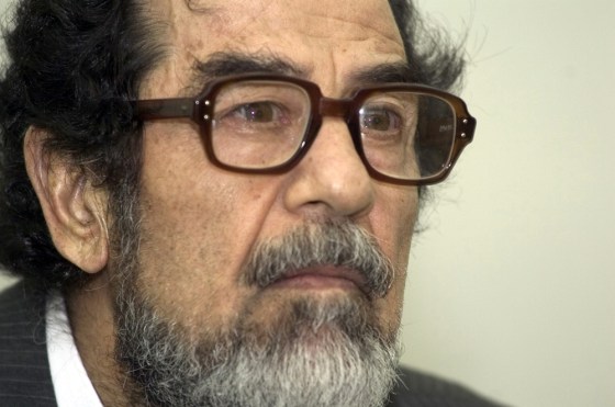 Saddam Hussein appears at the Iraqi Special Tribunal on July 21.