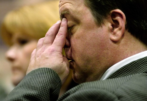 Joseph Smith wipes away tears during the