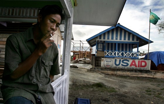 MAN SMOKES BY USAID HEADQUARTERS