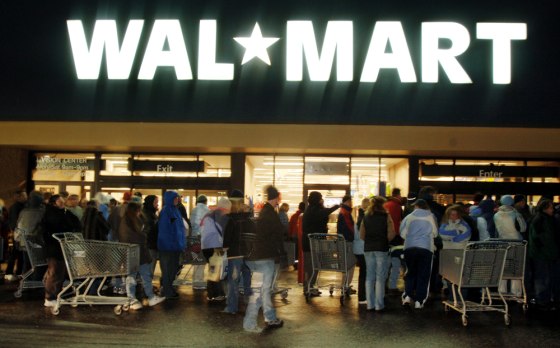 Early-morning shoppers line up outside a Wal Mart in Williston, Vt. on Nov. 25, waiting for the doors to open for the traditional day-after-Thanksgiving sale.