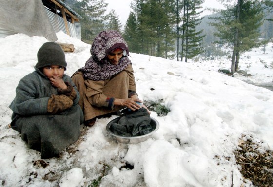 An Indian Kashmiri woman and child do th
