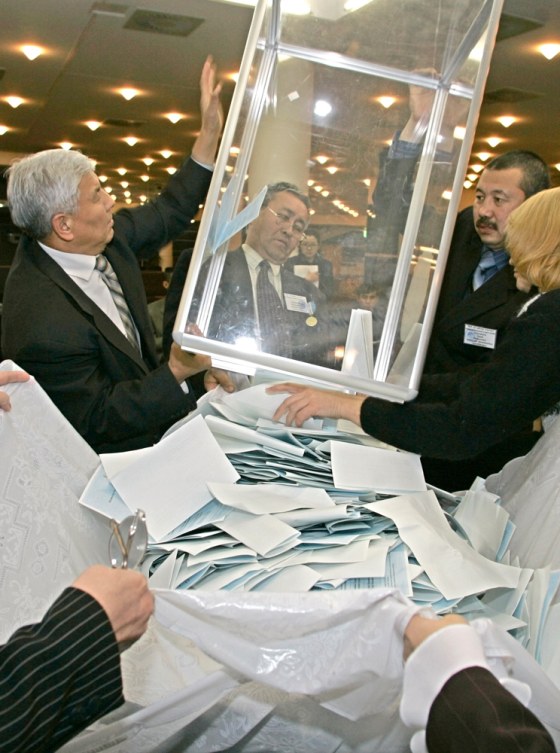 Members of Kazakh election commission count votes Sunday after polls close in the presidential election in Astana, Kazakhstan. Nursultan Nazarbayev, who has led the country for 16 years, is widely expected to gain another seven-year term.