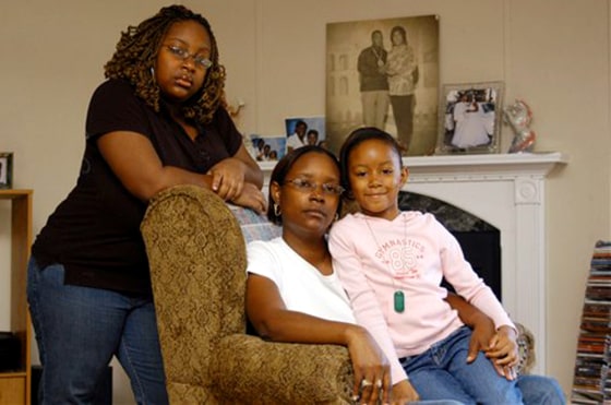 Michelle Thomas, center, and her daughters, A'Shanti Bush and Maia Bush, in their rental house in Abita Springs, La. The family was displaced from New Orleans by Katrina.