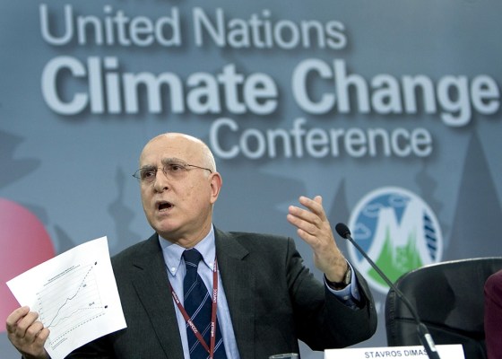 EU Commissioner of Environment shows chart during UN Climate Change Conference in Montreal