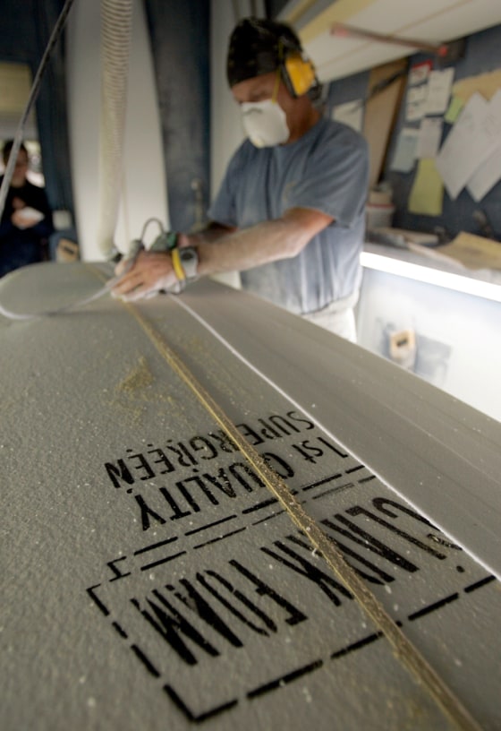Shaper Geoff Madsen does custom work on a Clark Foam board at Stewart Surfboards in San Clemente, Calif. Clark Foam, which enjoyed a virtual monopoly on the blocks used for customized boards, abruptly closed its doors for good last week.