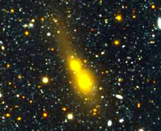 This image shows two galaxies still separated, but huge tidal forces of gravity are already pulling stars from them.