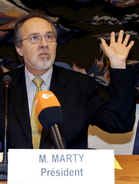 Swiss Senator Dick Marty presents his report on secret CIA prisons in eastern Europe to the Council of Europe Committee in Paris on Tuesday.