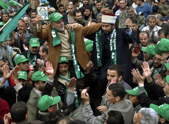 Hamas supporters participate in a rally Friday to celebrate the group's strong showing in municipal elections in the West Bank town Jenin.