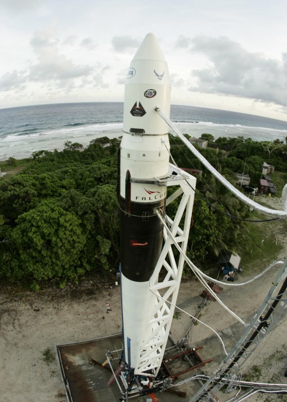 SpaceX's Falcon 1 rocket is readied for launch on its launch pad on a Pacific island.
