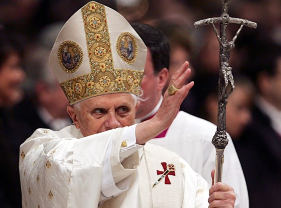 Pope Benedict XVI gives his blessing at the end of a Mass in St. Peter's Basilica, at Vatican, Sunday, to mark New Year's Day, which the Catholic Church celebrates annually as its World Day of Peace.