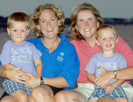 Family Pride Coalition executive director Jennifer Chrisler, left, and her partner, Cheryl Jacques, are seen with their twin sons. The family plans to go to the White House's annual Easter celebration.