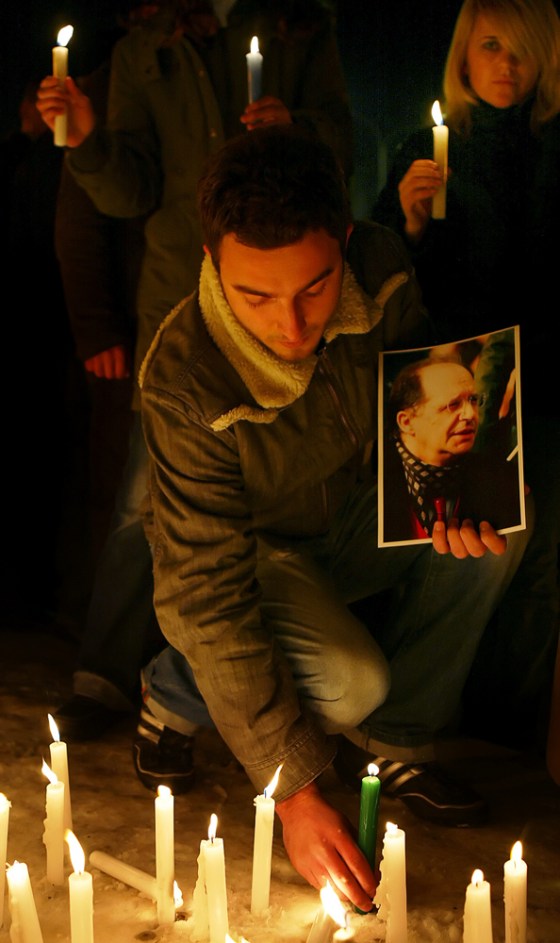 An ethnic Albanian holding a picture of