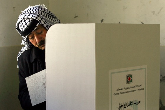 A Palestinian police officer votes in parliamentary elections in the West Bank city of Nablus on Sunday.