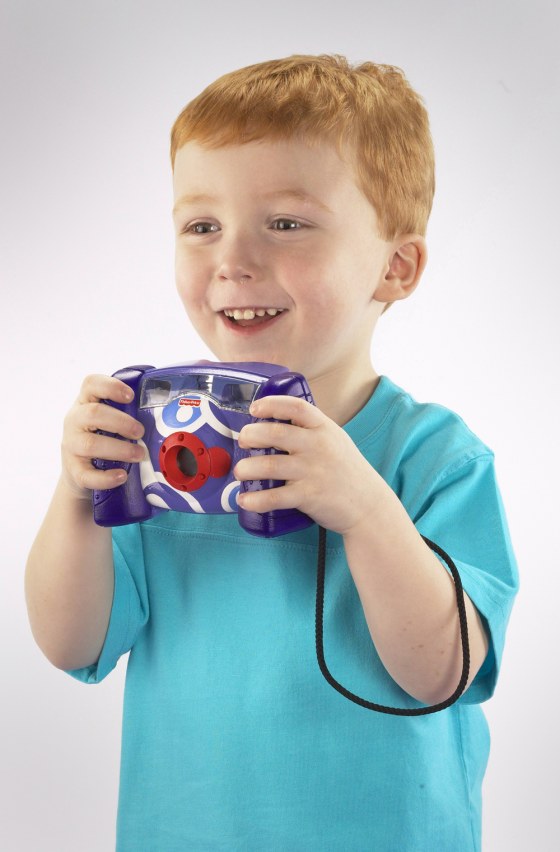 Handout photo of a young child playing with the new \"KidTronics\" digital camera from Fisher-Price