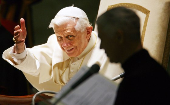 Pope Benedict XVI acknowledges cheering crowd during weekly general audience at Vatican
