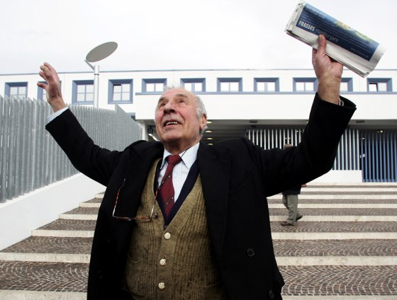 Luigi Cascioli gestures in front of the