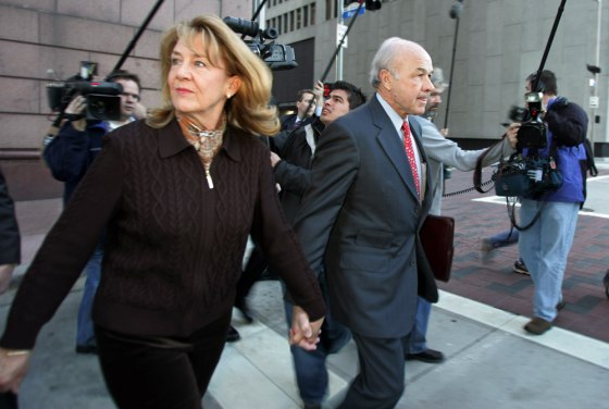 Former Enron CEO Lay arrives at federal court with wife Linda in Houston