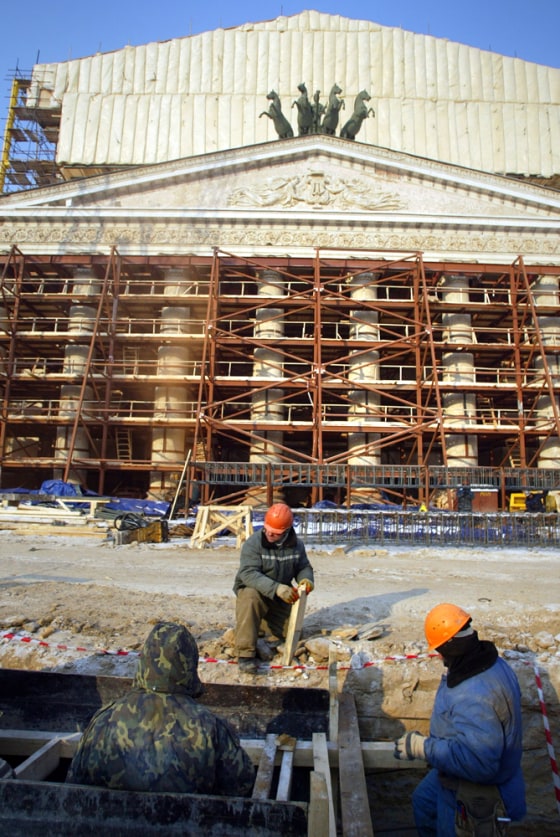 The facade of the famed Bolshoi Theater in Moscow is covered in scaffolding as work continues on a major restoration. The work is intended to bring the theater in line with the technical demands of modern ballet and opera productions. It is due to reopen its doors in March 2008.