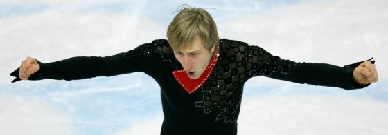 Evgeni Plushenko celebrates after his routine in the men's free skate Thursday. "It's everything, everything," he said when asked why Russia, his country, dominates the Olympics.