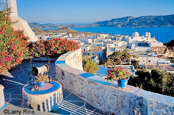 Milos Island view with the famous white-washed buildings of Greece.