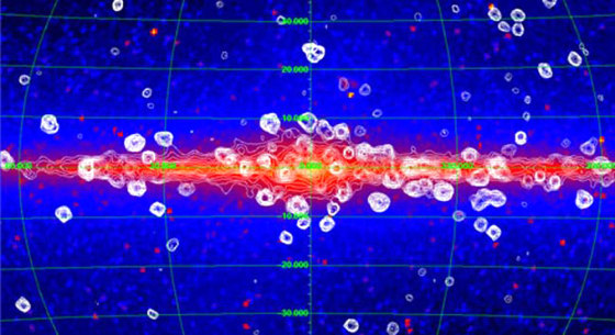 Readings of the galactic X-ray background are superimposed on an image of infrared sources. The X-rays, shown as white contour lines, were detected by NASA's Rossi X-ray Timing Explorer. Everything else is the infrared background. The white knots reveal very bright X-ray activity, mostly from black holes and neutron stars.