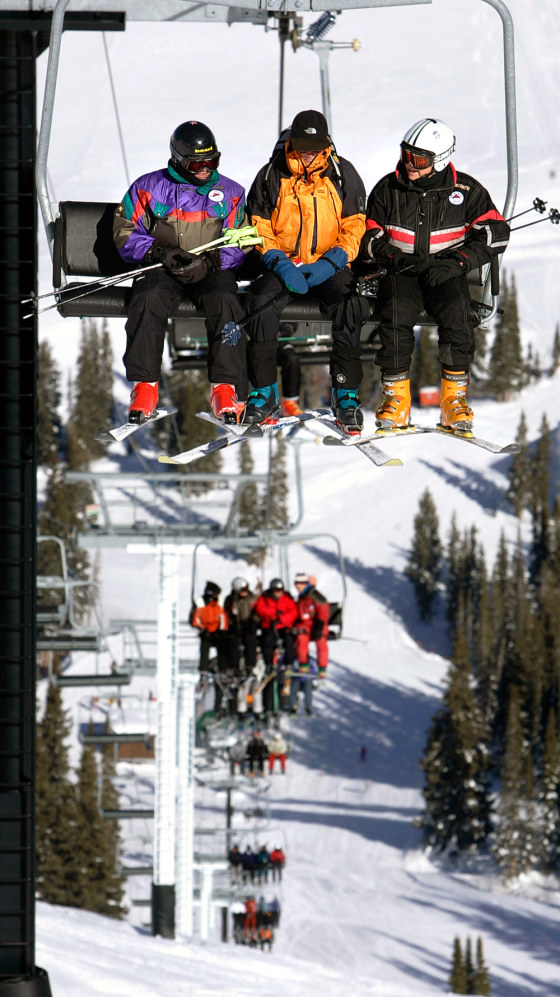 Skiers take a lift at Alta ski resort in Utah on Dec. 14 during what's been an excellent winter for resorts across the state.