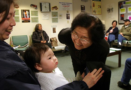 Angela Zheng, 9 months, and mother Flora Zheng accompany grandmother Qi Chen to MobileMed's Pan Asian Health Clinic, where doctors share a language and culture with patients, making treatment that much easier.