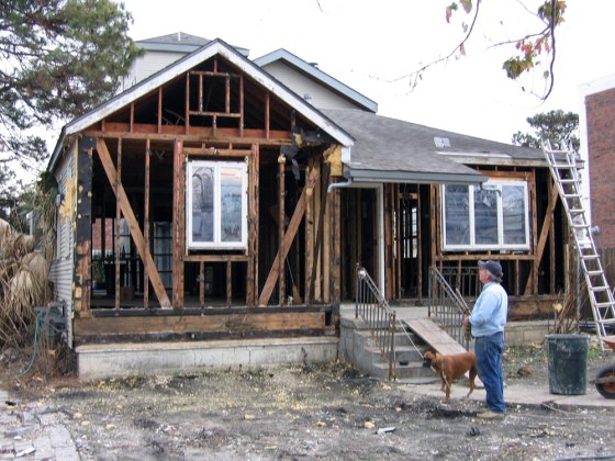John Potts, 52, stands in front of his Lakeview home. After Hurricane Katrina, the water reached 7 feet above the floor. He has stripped the home back to the studs and was preparing to rebuild. Like many others, he is not planning to elevate the home because he believes that a rebuilt levee system will protect the area. "If it floods again," he said, "I'm out of here."