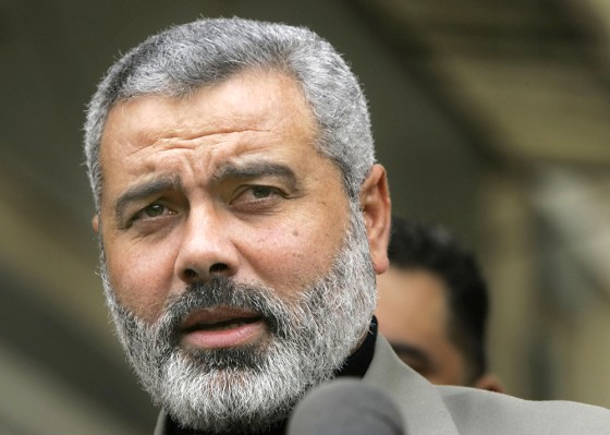 Incoming Hamas Prime Minister Ismail Haniyeh speaks to the media after talks with Abed Allah Horani, a former Palestinian official in Gaza City, on Sunday.