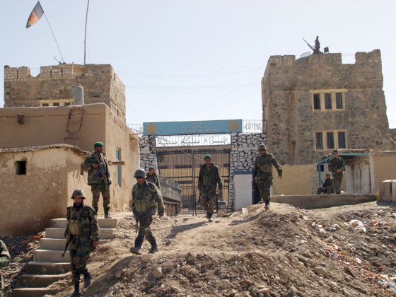 Afghan soldiers come out of the Pul-i-Charkhi prison on the eastern outskirts of Kabul