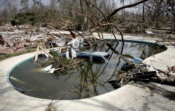 A vehicle submerged in a swimming pool in Pass Christian after Hurricane Katrina