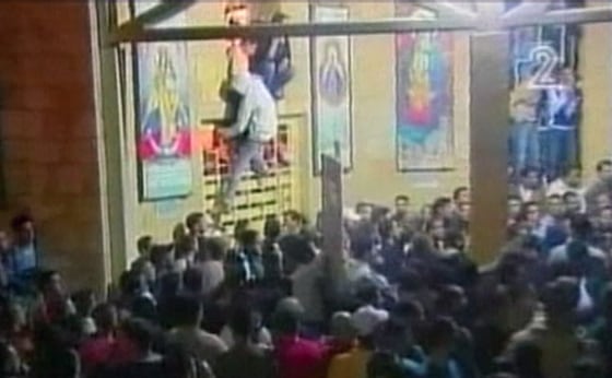 Riots engulfed one of Christianity's holiest sites after attackers threw firecrackers into the church on Friday.