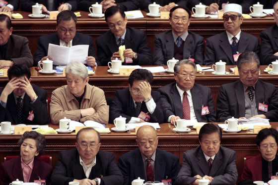 Delegates listen to speeches at the open