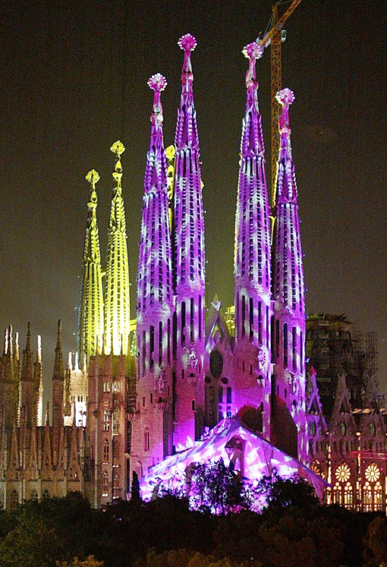 Antoni Gaudi's unfinished Sagrada Familia, is lit up during a fireworks and light show display in Barcelona, Spain, Saturday, June 1, 2002, celebrating the 150th anniversary of the birth of this Catalonian architect.
